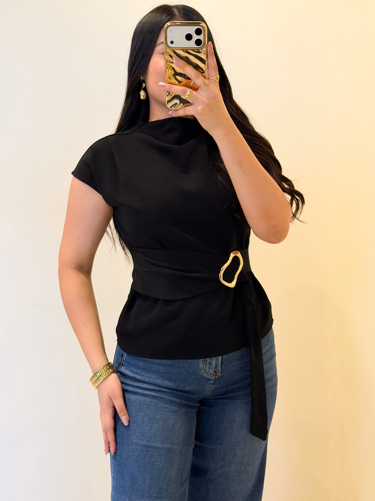 Blusa con detalle dorado