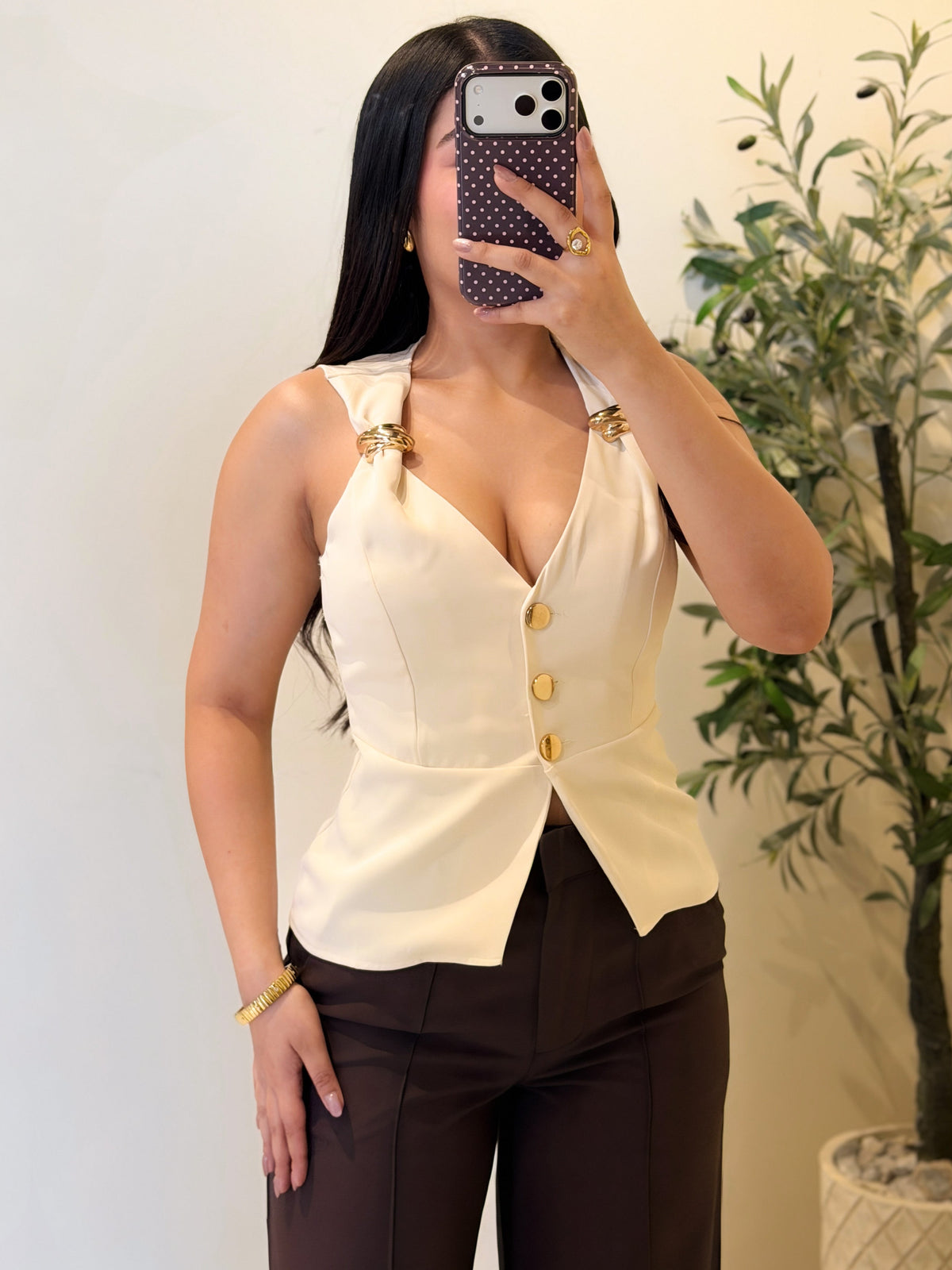 Blusa con detalles dorados