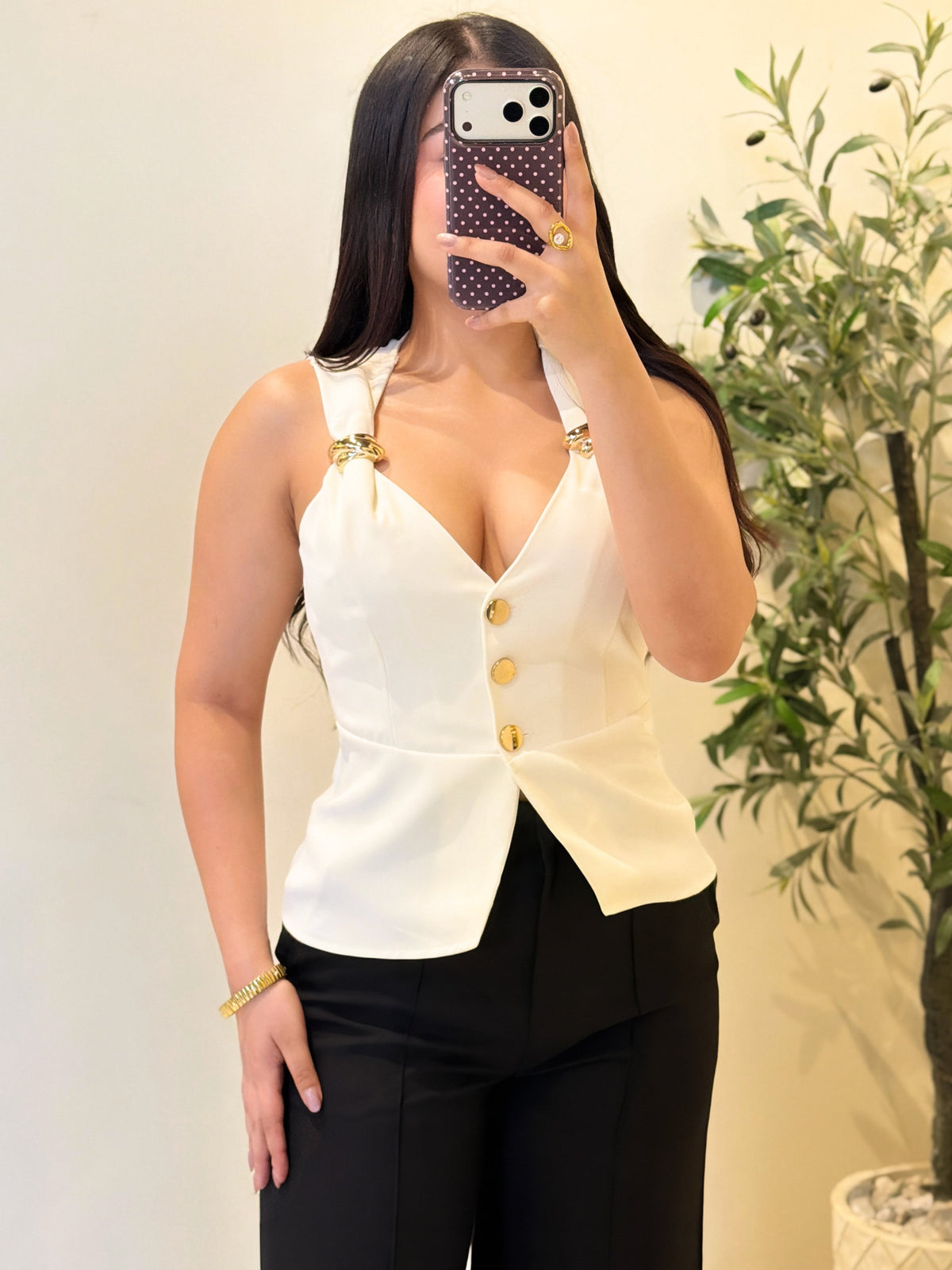 Blusa con detalles dorados