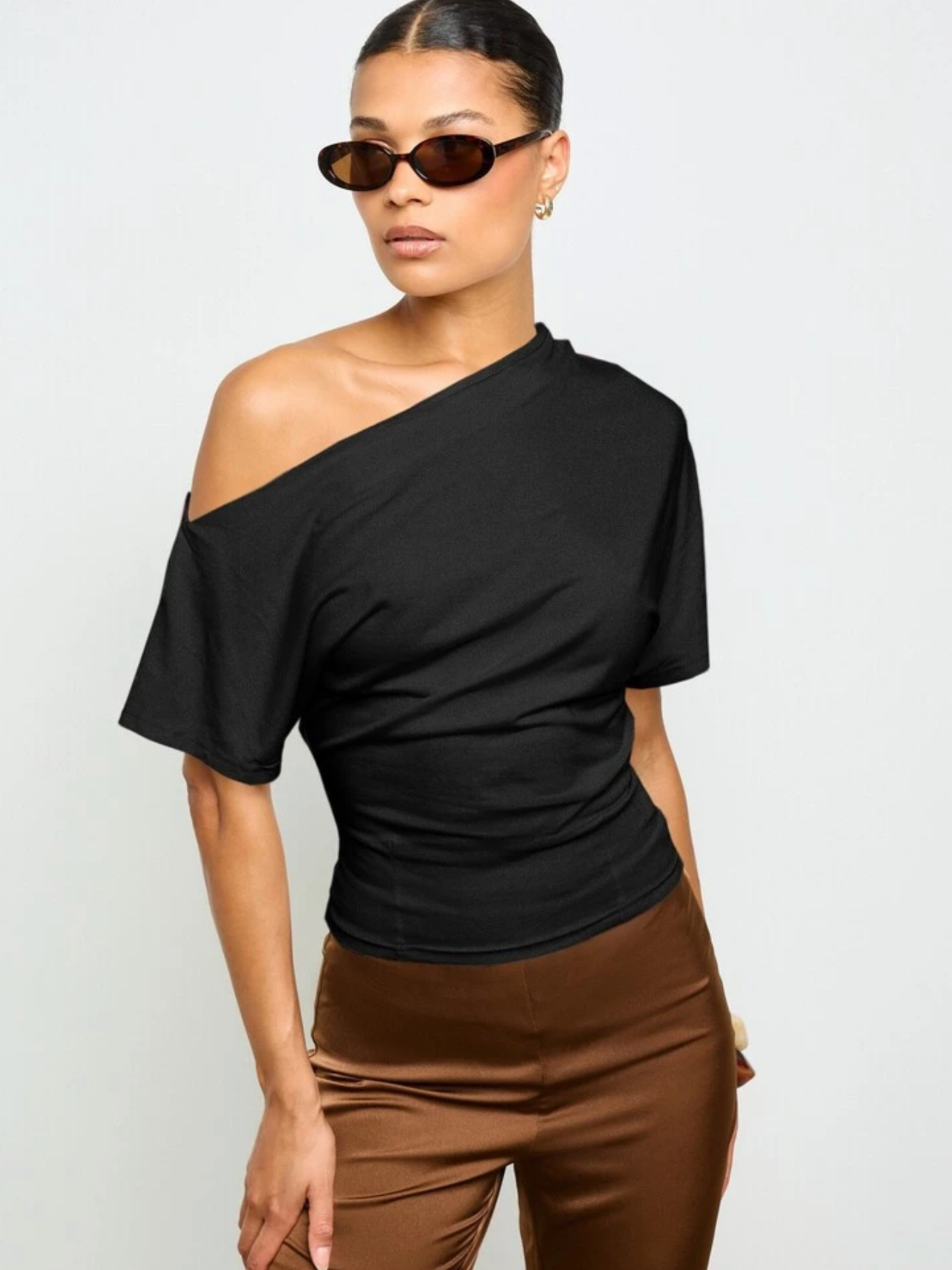 Blusa asimétrica cintura ajustada