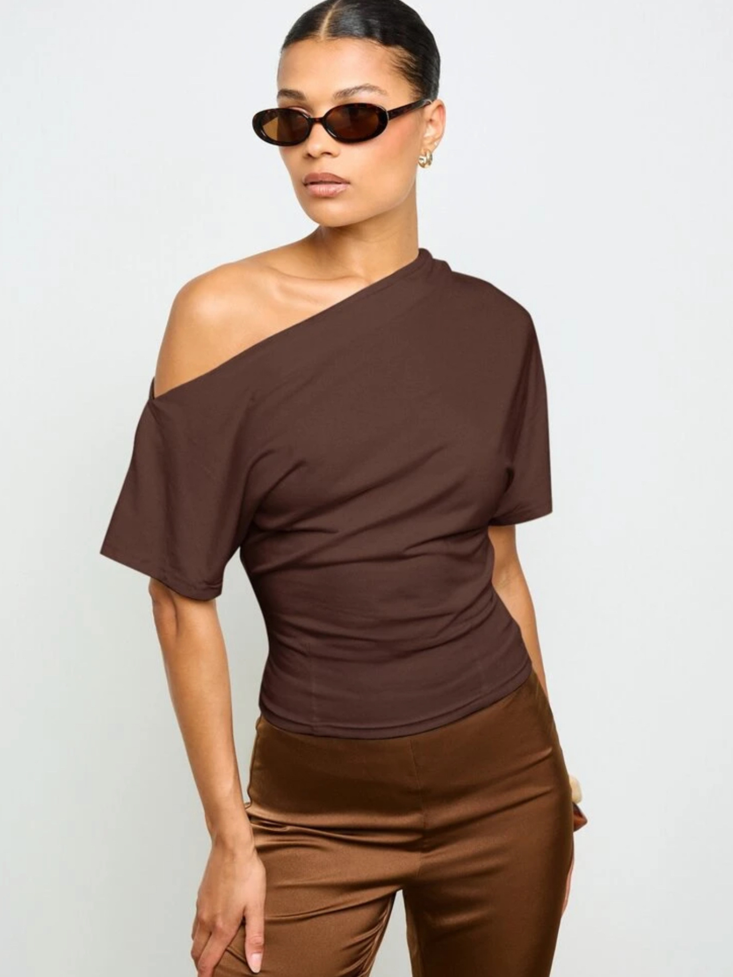 Blusa asimétrica cintura ajustada